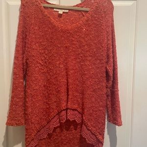 Coral sweater top with lace edging at bottom color in photo is not true color